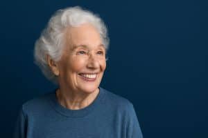 Lady smiling after getting dental implants in Brooklyn, NY